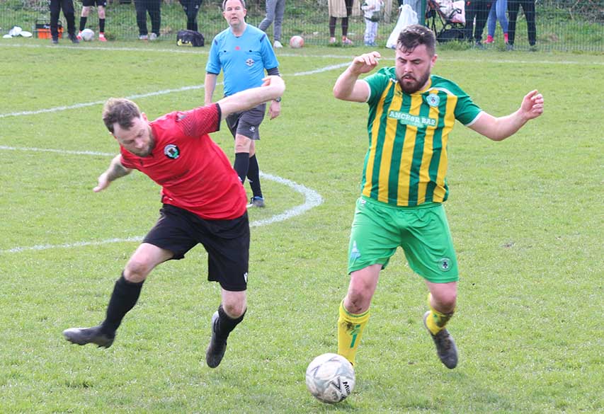Ardglass' Karl O'Neil in action with Killough Jamie McLaughlin.