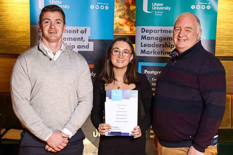 Downpatrick Ulster Uni Student Gets Excellence Award xa0Ulster University prize winner Erin Mason (centre) from Downpatrick pictured with Samuel McCormick (left) from award sponsor Grant Thornton and Course Director Paul Dickson.