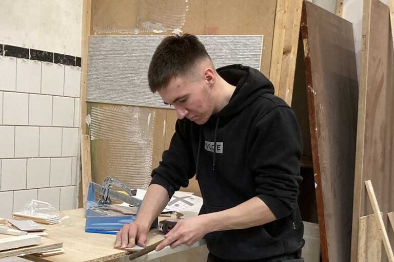 David Wright, xa0from Dundrum, xa0a SERC Level 2 Apprenticeship NI in Wall & Floor Tiling, employed by MG Construction.