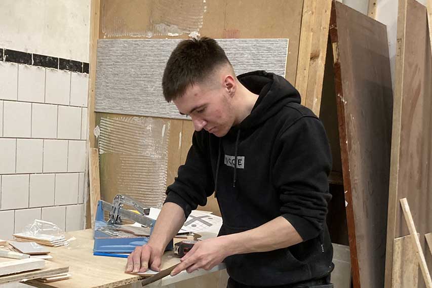 David Wright, xa0from Dundrum, xa0a SERC Level 2 Apprenticeship NI in Wall & Floor Tiling, employed by MG Construction.