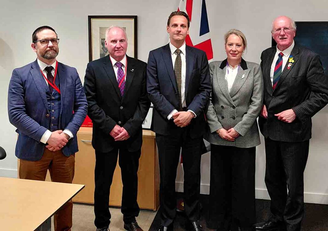 Shannon And Fishing Reps Talk In Home Office